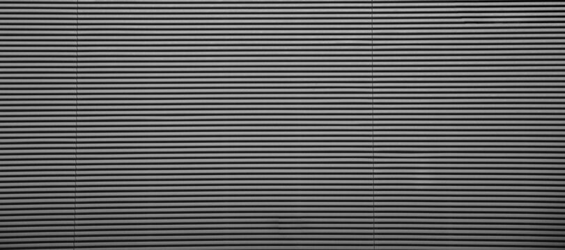 Iron Grille wall Aluminum louver shutters form the dusty surface or background. Curtains made of aluminum grid. Metal grating.Metal structure. Detail texture.Background.Chrome  wall. abstract pattern.