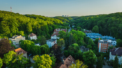 Gdansk, Wrzeszcz. Jaskowa Dolina in the evening. Beautiful view of the green valley and tenement houses. © Kamil