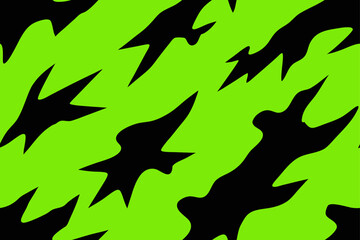 Abstract black shapes on a green background