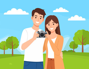 A happy young couple is standing in a park, holding a camera and smiling. The illustration shows them enjoying their time together and sharing a hobby.