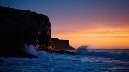 Dramatic sunset over rocky coast