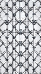 Geometric, repeating pattern of metal and glass