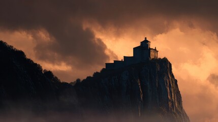 Obraz premium Mountaintop lighthouse at sunset
