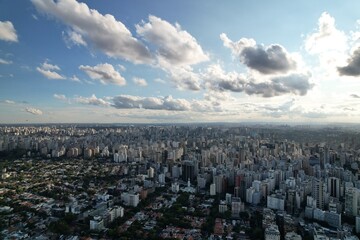 Vast urban skyline of Sao Paulo featuring dense buildings and cloudy sky