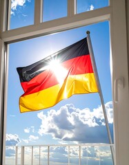 German flag waving in bright sunlight