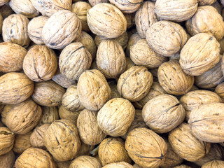Abundance of brown walnuts in close-up display