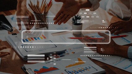 A dynamic business meeting scene featuring engaged hands discussing financial reports, graphs, and digital overlays, illustrating collaborative analytics and strategy. Raster