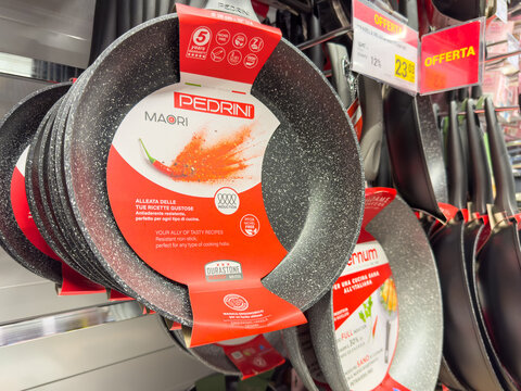 Gemona, Italy - September 24, 2025: Pedrini Maori frying pans displayed on store shelf, showcasing vibrant design and quality materials, ideal for cooking enthusiasts and home chefs
