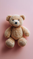 Obraz premium Cute teddy bear toy lying on pink background. 