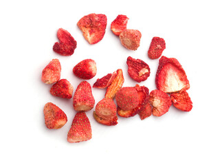 slices of dried strawberries on a white background