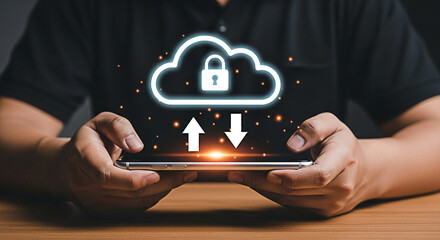 Man using secure cloud storage on mobile phone for data transfer and protection with digital technology and online security on a wooden table
