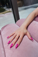 Beautiful and delicate female hands with a new perfect manicure