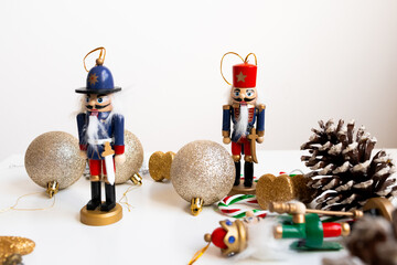 Festive nutcracker decorations with glitter ornaments and pinecones
