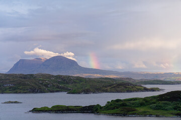 Rainbow forming next to the Quinag mountain range. Photograph taken from Upper Badcall Bay.