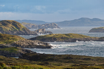 Atlantic waves crashing against the islands surrounding Badcall Bay by Scourie on the west coast of Scotland