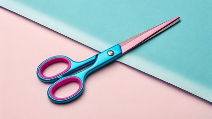 Colorful scissors with blue and pink handle on pastel paper background 
