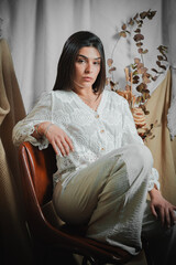Obraz premium Young Latina woman indoor fashion photography. Vintage style.
