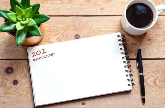 notebook and coffee cup