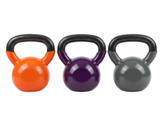 Three colorful kettlebells stand neatly in a row on a stark black backdrop