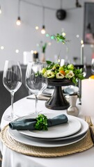 Elegant dinner table setting with fresh floral arrangements