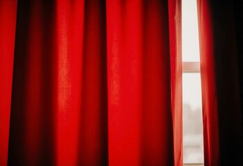 Rich red curtains frame the window, allowing soft afternoon light to filter through. The fabric adds warmth and color to the inviting interior atmosphere Generative AI