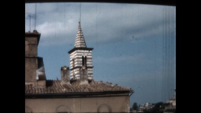 Bell Tower of the Church of San Giovanni 1964 - Viewing the bell tower of the 15th century Church of San Giovanni Baptist of the Almadiani in Viterbo, Italy, 1964.