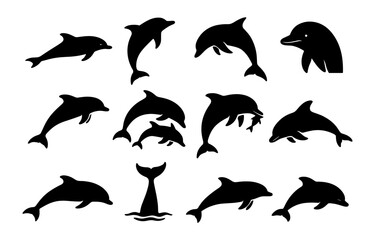 Naklejka premium Black silhouette collection of dolphins in various poses and angles for marine design