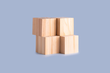 Obraz premium Four wooden cubes