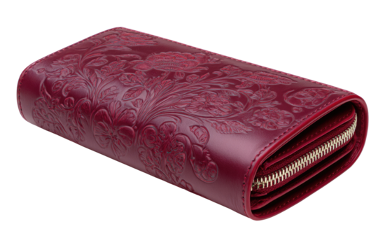 A maroon leather wallet with embossed floral pattern and zipper closure. background removed