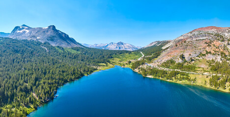 Fototapeta premium Aerial Tioga Lake Sierra Nevada Mountains Forest and Road Panorama