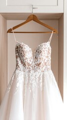 Elegant wedding dress on hanger