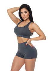 Fototapeta premium Beautiful athletic woman in dark gray fitness attire, isolated on a transparent background PNG, showcasing active lifestyle and workout apparel, perfect for fitness-related content