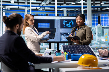 Solar energy researchers test new photovoltaic technologies in controlled lab environment, aiming to enhance solar panel performance and maximize energy output during research and development process