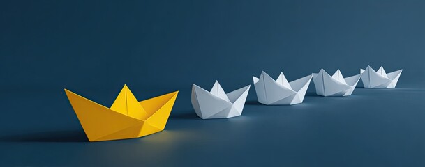 A single bright yellow origami boat stands out amongst a row of white origami boats on a deep blue surface
