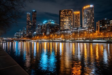 Obraz premium Stunning Night View of Melbourne Skyline with Reflection in Yarra River Water
