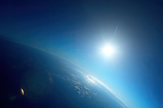 Earth from space, sun prominent