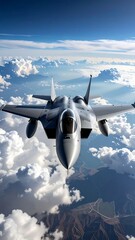 Fighter jet soaring through a vast, cloudy sky