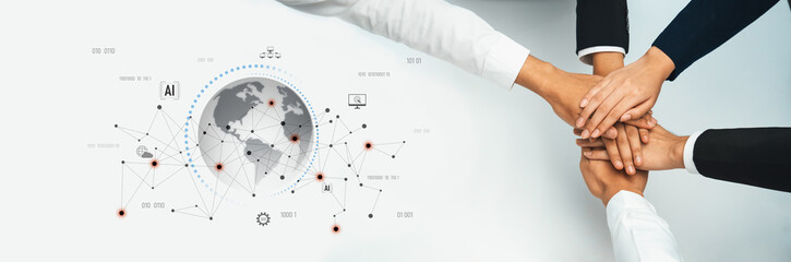 Obraz premium Hands coming together symbolize collaboration and unity in a modern business setting, highlighting global connectivity and digital innovation. Trope