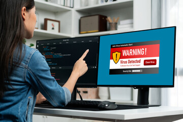 Virus warning alert on computer screen detected brisk cyber threat , hacker, computer virus and malware