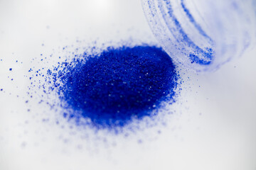 Close up of Blue Copper Peptides in Powder and Liquid Form