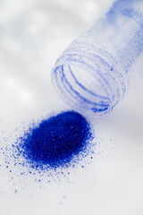 Close up of Blue Copper Peptides in Powder and Liquid Form