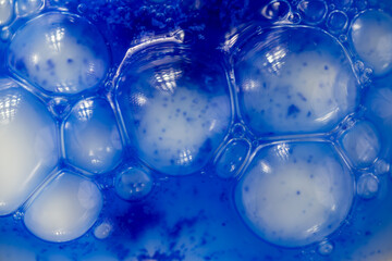 Close up of Blue Copper Peptides in Powder and Liquid Form