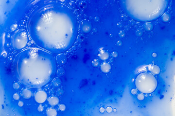 Close up of Blue Copper Peptides in Powder and Liquid Form
