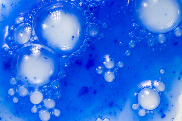 Close up of Blue Copper Peptides in Powder and Liquid Form