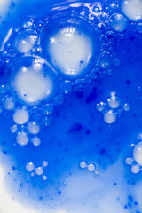 Close up of Blue Copper Peptides in Powder and Liquid Form