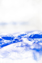 Close up of Blue Copper Peptides in Powder and Liquid Form