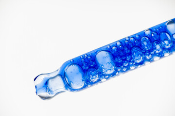 Close up of Blue Copper Peptides in Clear Pipette