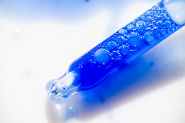 Close up of Blue Copper Peptides in Clear Pipette