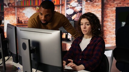CTO manager overseeing work done by engineer in tech agency providing software development...