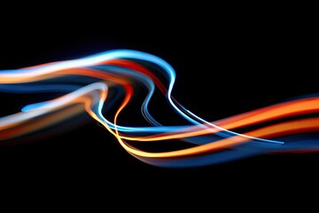 Abstract light trails on a black background